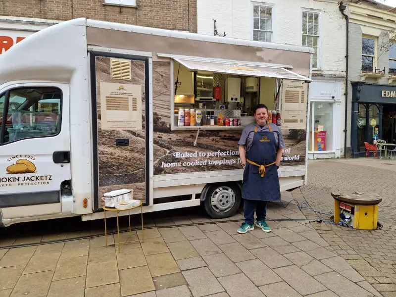 Jay King outside the Smokin' Jacketz food van